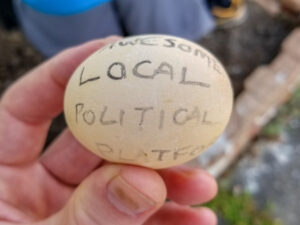 Egg with "Awesome Local Political Platform" written on it.